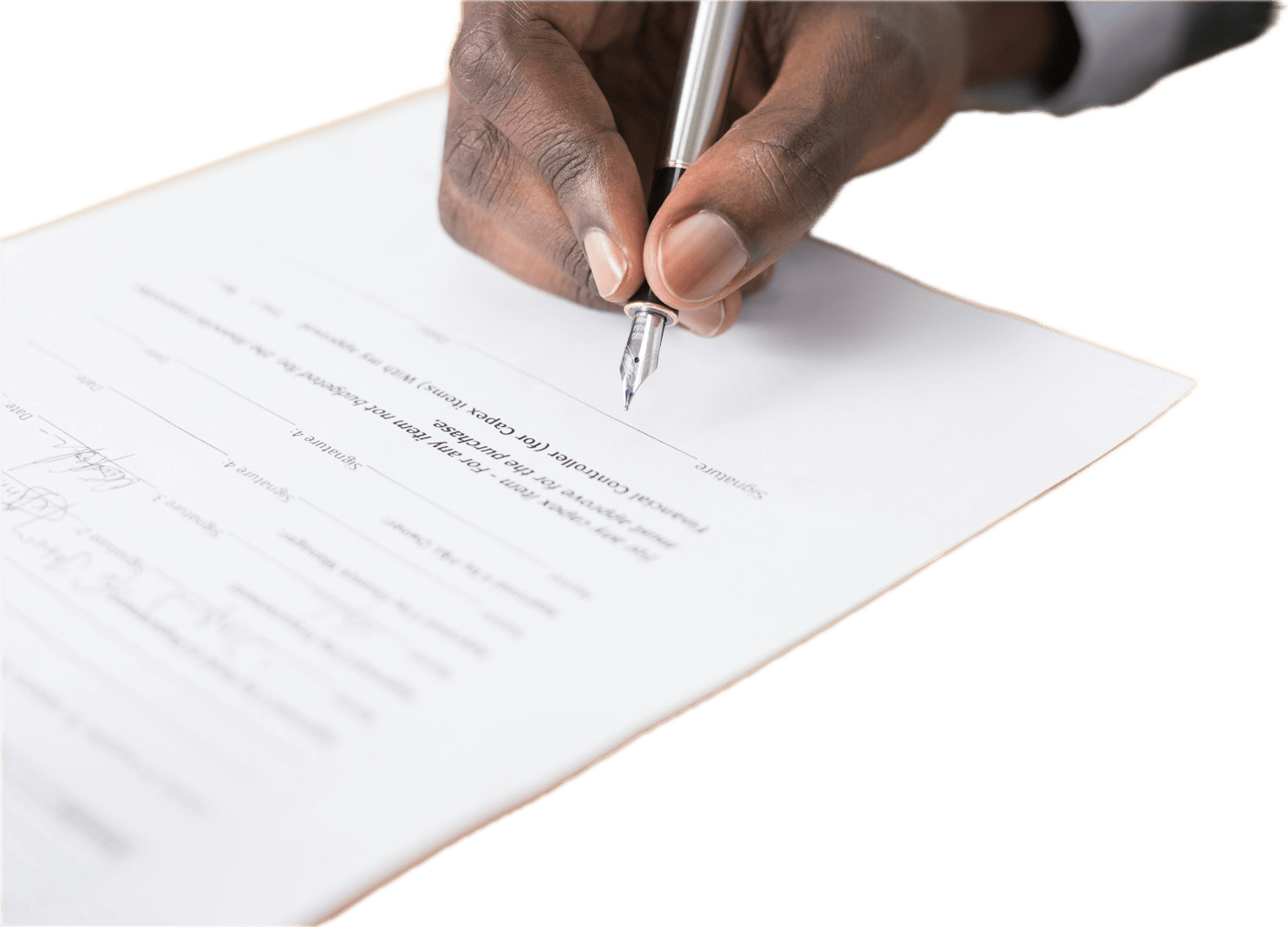 A hand signing a contract with a pen